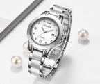 Sunkta Montre féminine deux‑tons acier et or rose